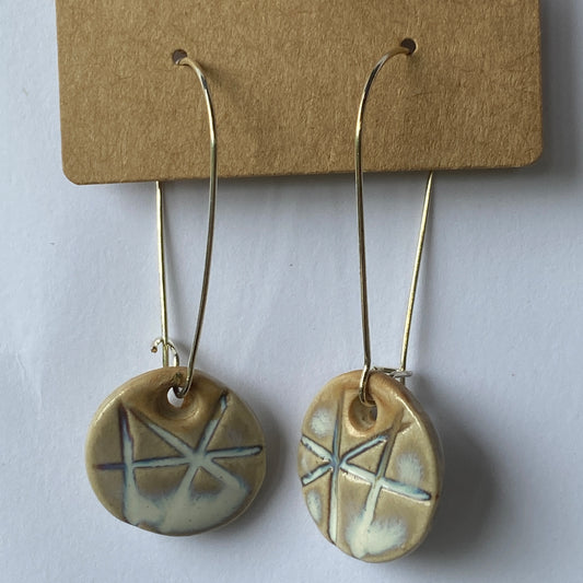Disc earrings on long kidney hooks - milk glass geometric