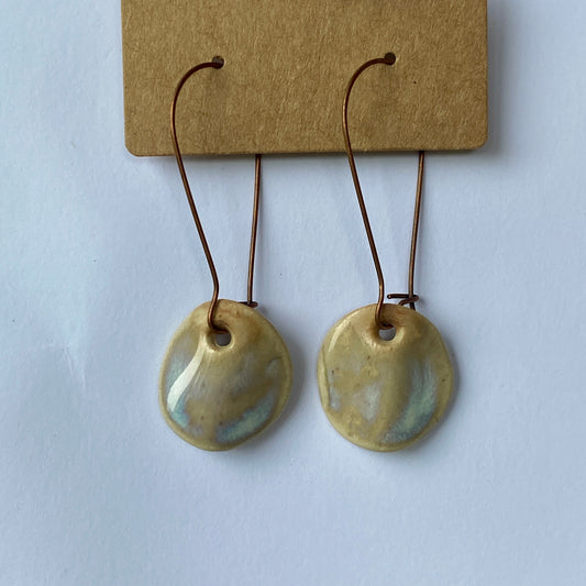 Disc earrings on long kidney hooks - milk glass