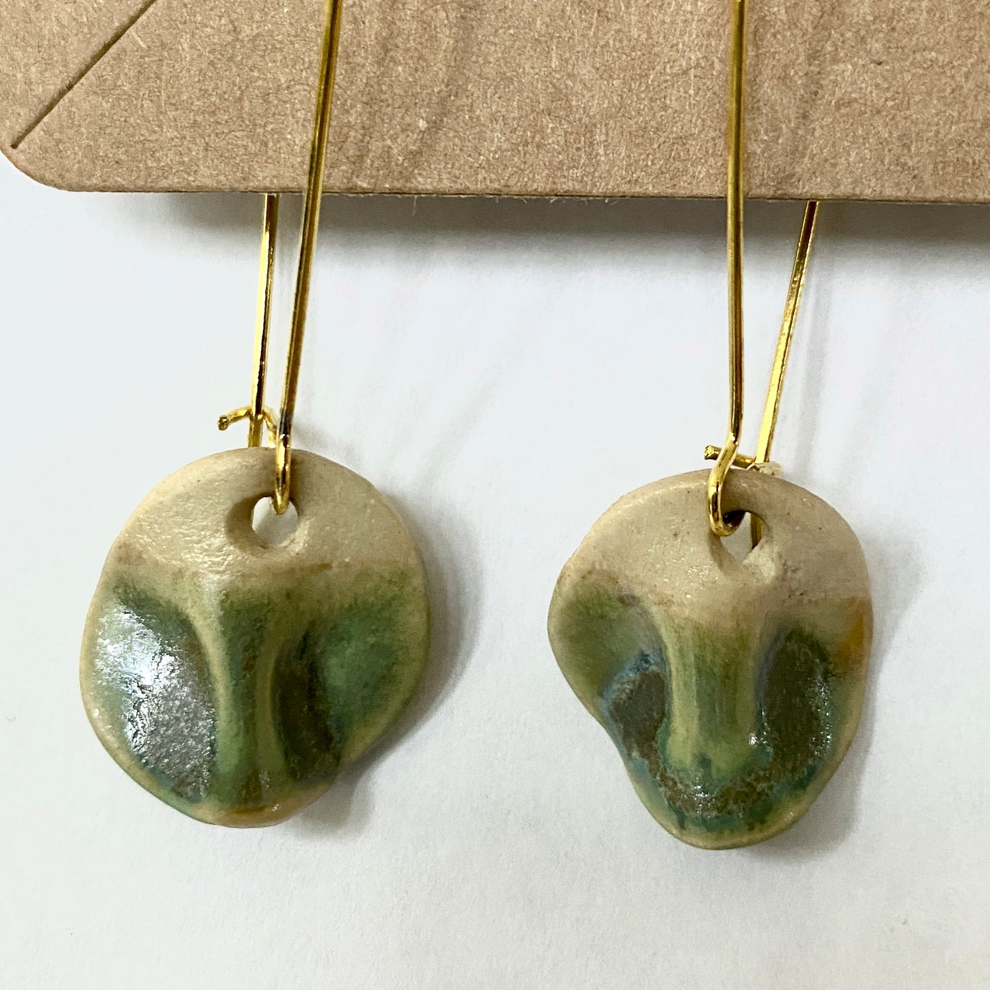 Disc earrings on gold hooks - green