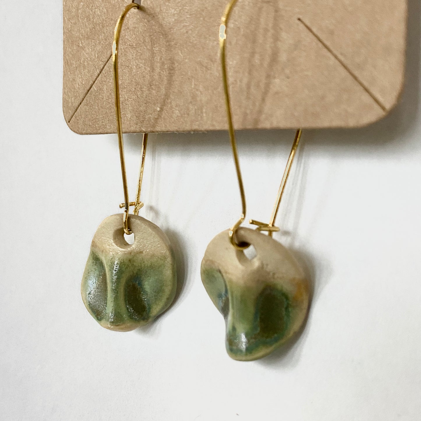 Disc earrings on gold hooks - green