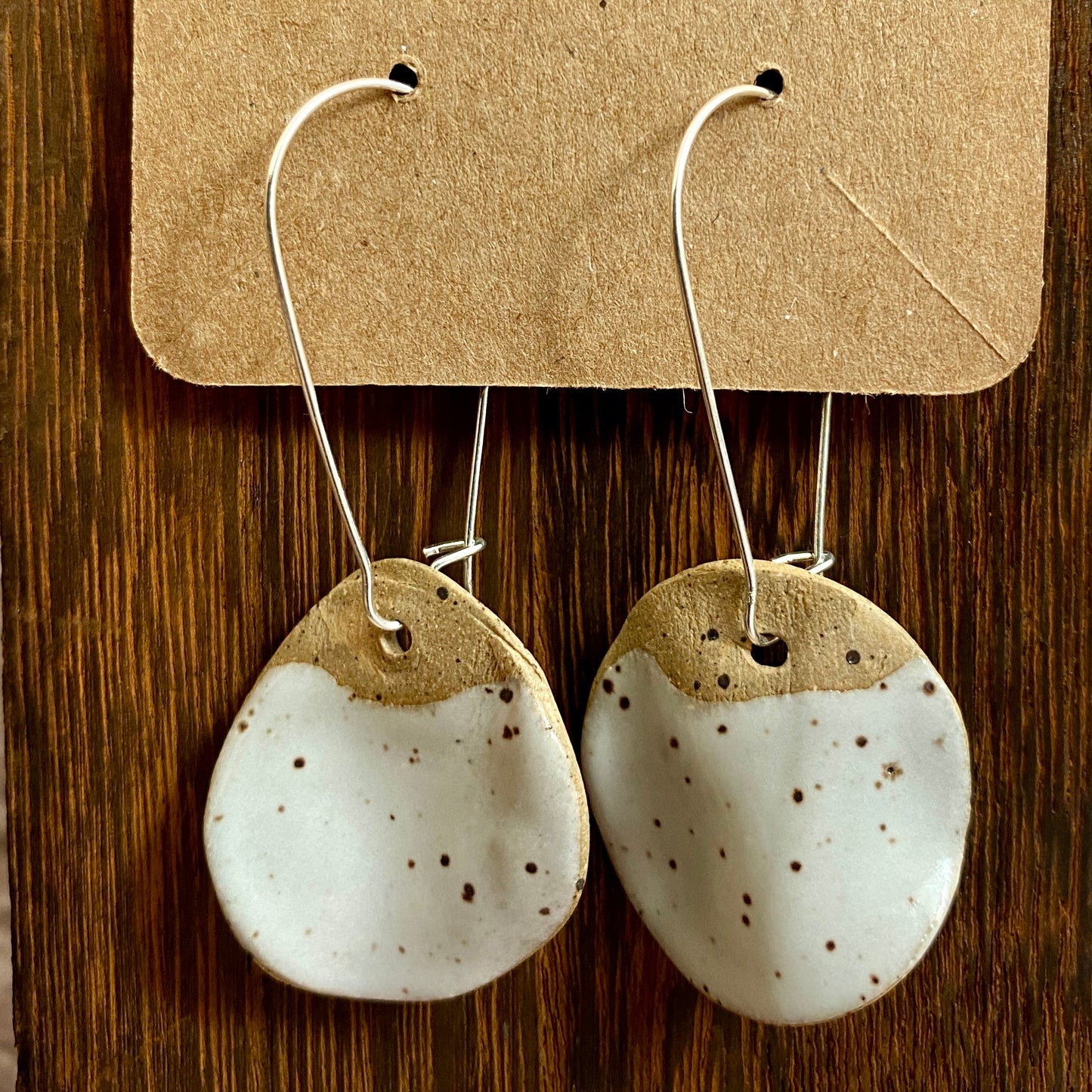 Disc earrings on silver hooks - white