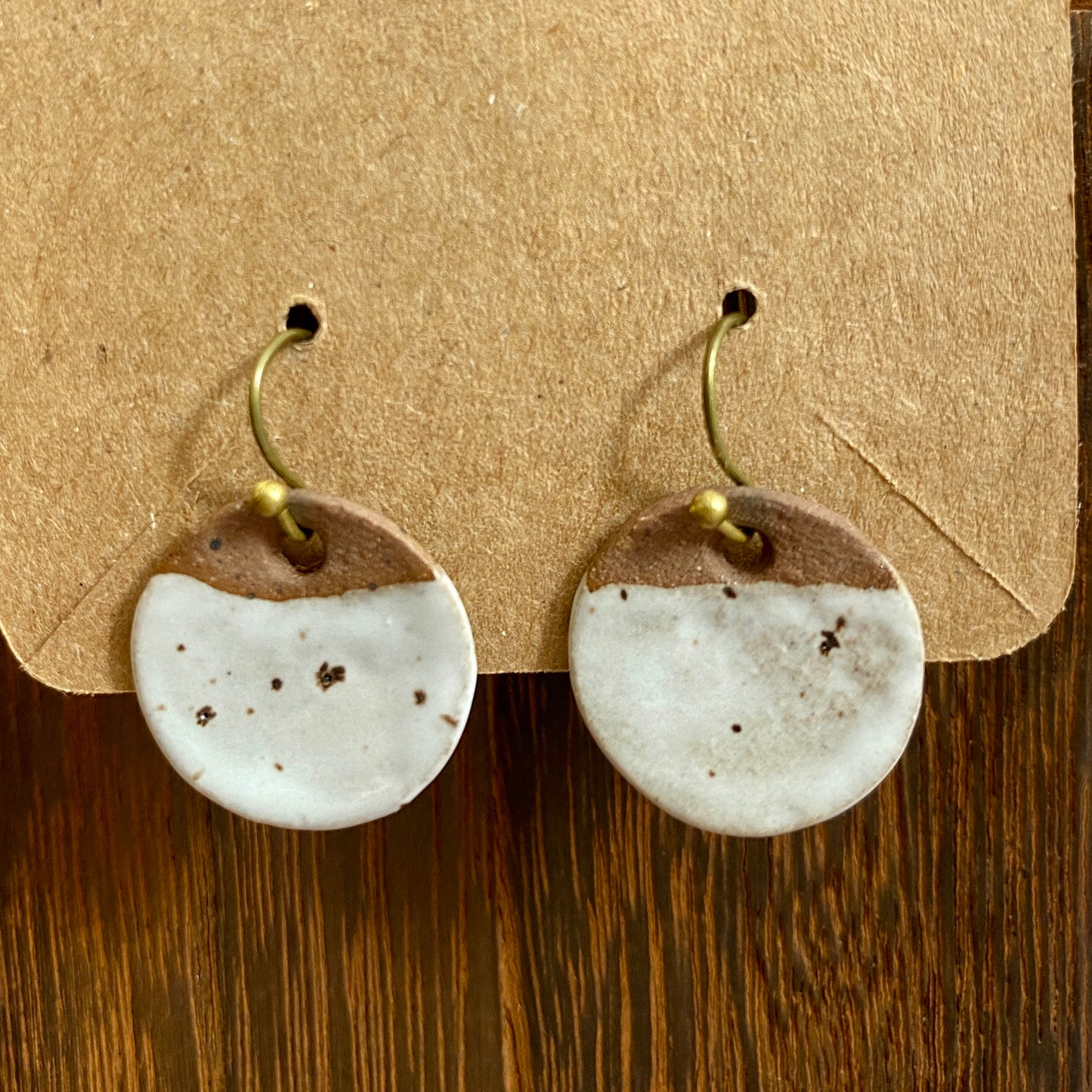 Disc earrings on brass hooks - white