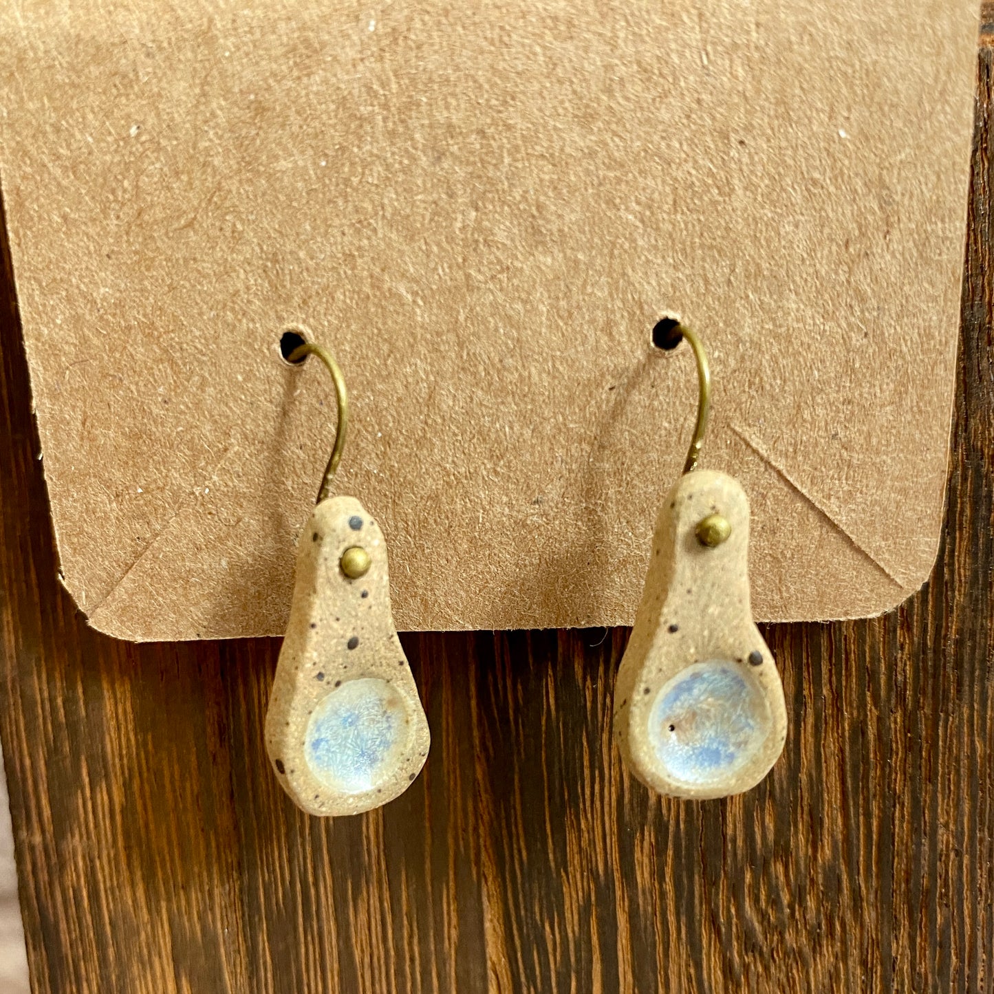 Avocado-shaped earrings on brass hooks